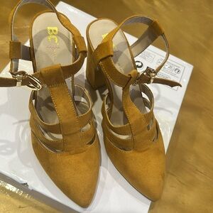 BC  Born in California, beautiful heels with straps and buckle., suede  leather.
